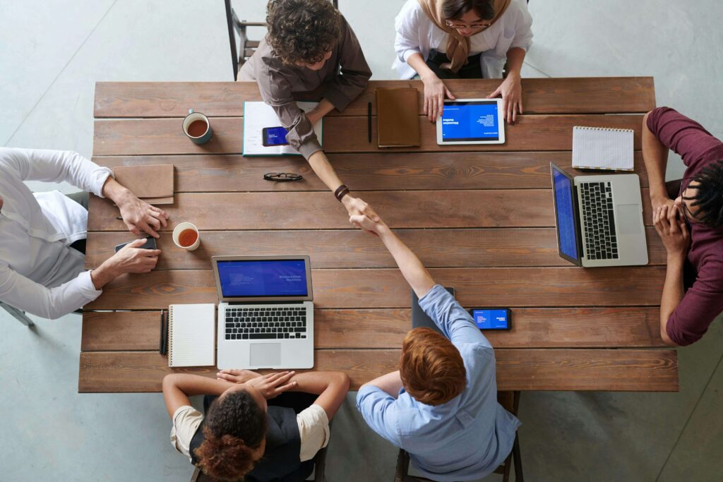 Group of marketers discussing strategies for crafting a copy of Google Ads. Explore CAS's approach to effective ad creation.